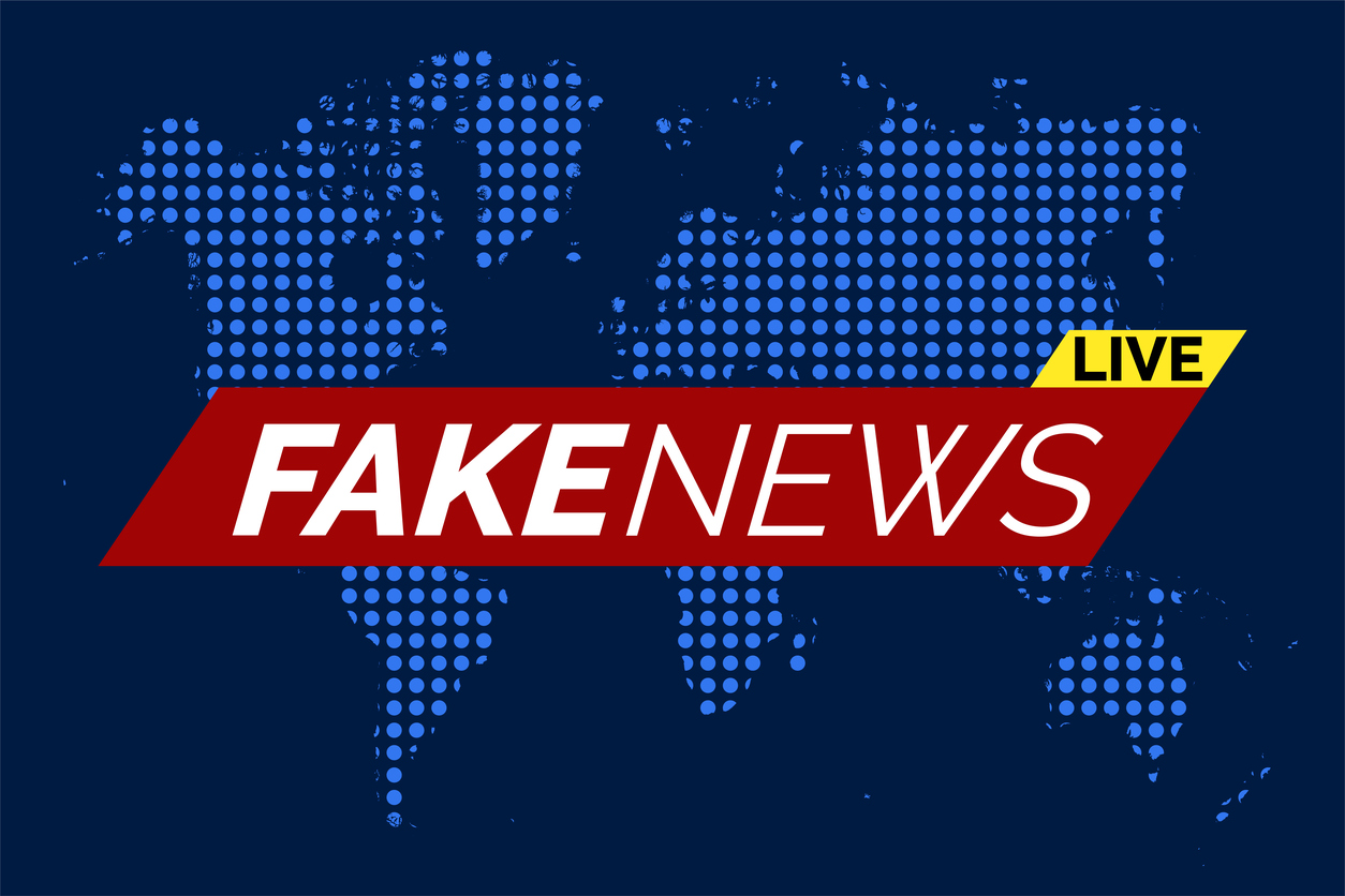 The words "Fake News" superimposed on a world map in the style of a breaking news card.