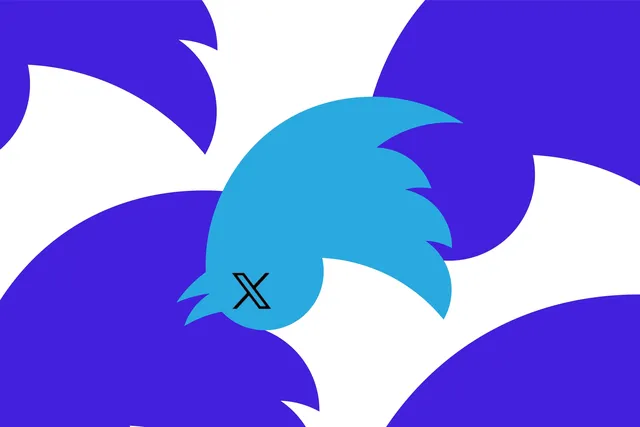 The image is a simplified or stylized representation of a blue bird in profile, likely intended to represent Twitter's logo. It appears against a background of purple shapes. The bird's eye is replaced with a black \"X,\" which might suggest a critical or negative commentary about Twitter or could symbolize the bird being silenced or inactive. This alteration from the standard Twitter logo could be for artistic, satirical, or commentary purposes.